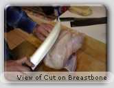 Chicken cut along breastbone