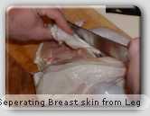 Seperate chicken skin between breast and leg quarter