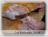 Cut between wing joint on chicken