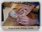 Seperate wing joint from chicken Seperate wing joint from chicken